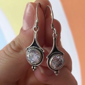 SILVER SPARKLE DANGLE EARRINGS.